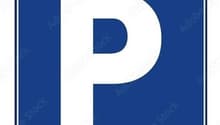 Blue sign with white 'P', indicating parking area.