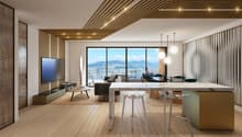Large windows with views, modern decor, leather sofa, coffee table, television, floor lamp