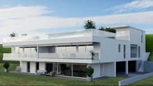 Modern house with two floors, large windows, glass balcony, underground garage, and lush landscaping.