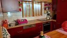 kitchen, sink, oven, dishwasher, red cabinets, countertop, small windows, open shelves
