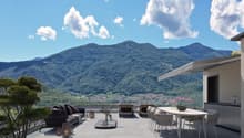 outdoor furniture, plants, panoramic mountain view, dining table, canopy, canopy lamp, fireplace, glass walls