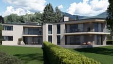3 story house, white walls, large windows, terrace, garden, view of the mountains