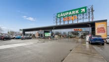 COOP supermarket, modern building, parking lot, advertising signs