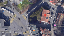 The image shows a map of a city street intersection, with various landmarks and buildings labeled. The streets visible include Rue de l'Industrie and Rue de Verdaine. There is a city stadium or park labeled 'City stade du parc de la place du Nord', as wel