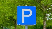 Blue square parking sign with white 'P'