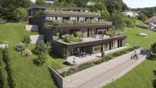 modern house, raised ground floor, multiple terraces, green roofs, surrounded by greenery