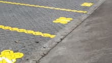 paved parking area with yellow markings
