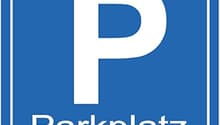 Blue sign with a white P in the middle, and 'Parkplatz' in white underneath