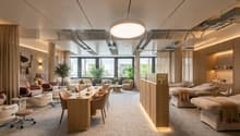 Lighting from ceiling and wall, couches, massage tables, tables, chairs, plants