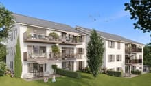 Modern apartment building with multiple balconies, landscaped garden, and outdoor seating areas