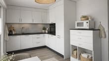 modern kitchen with white cabinets, black countertops, microwave, oven, sink, faucet, wooden floor, dining table, chairs, decorative items