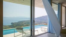 spacious interior, glass sliding doors, pool, lounge chair, ocean view
