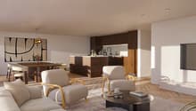 Contemporary interior, neutral palette, wooden flooring, seating area with armchairs, round coffee table, kitchen with island, dining table with chairs, mounted flat screen TV