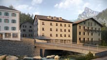 Mountain view, bridge over the river, several buildings, stone wall, rocks, lush greenery
