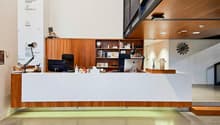 wooden desk, modern decor, office chairs, computer monitors, wooden cabinets, bookshelves, decorative items