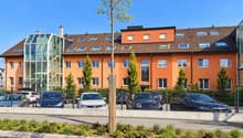 Immeuble_terracotta_avec_parking_paysager.png