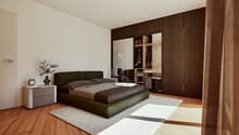 Spacious bedroom with a large bed, dark wood furniture, and built-in wardrobe. The room has hardwood floors and neutral-colored walls, creating a cozy and modern atmosphere.