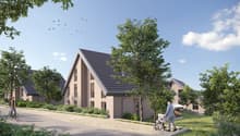 Modern houses, gray roofs, beige walls, windows, front yard with trees and grass, pathway, people walking, one with a stroller, one riding a bicycle