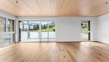 large windows, sliding glass doors, wooden floor, balcony, view of the outside