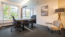 Two desks, chairs, small table, picture, lamp