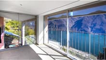 large terrace, panoramic view, glass sliding doors, beige flooring