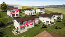 6 individual villas, sold out, situated in a calm area, close to amenities, with a privileged location, brown roofs, white walls, green surroundings, and a serene environment.