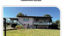 Pink house, large outdoor area, detached garage, green lawn