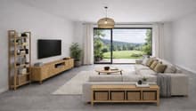 Modern living room with large windows overlooking a golf course