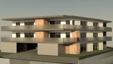 3-story apartment building with a modern, minimalist design. The building has a rectangular shape with a flat roof and large windows. The exterior features a combination of concrete, wood, and glass materials. There is a garage and parking spaces visible