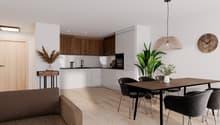 modern kitchen with wooden cabinets, white countertops, black chairs, wooden table, brown couch, wooden floor, white walls, plants, lamp, clock