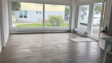 large windows, wooden floor, white walls, empty room
