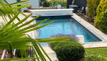 Piscine avec couvert chauffant