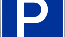 Blue square sign with a white 'P' symbol, indicating a parking area or parking lot.
