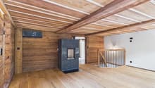 wooden walls, wooden floor, fireplace, staircase
