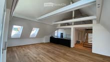high ceilings, hardwood floors, open kitchen, two windows