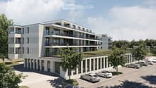 5 story residential building, balconies on multiple floors, green roofs, large windows, multiple parking areas