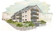 multiple story building, beige exterior, many windows, balconies on each floor, surrounding gardens