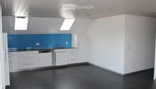 kitchen area, white cabinets, blue backsplash, tiled floor, sink, dishwasher, white ceiling, two skylights