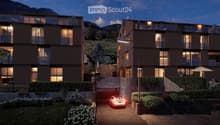 2 story house, brown exterior, multiple balconies, garage, garden, mountain view