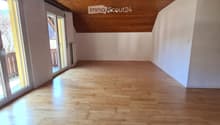 empty room, wooden floor, wooden ceiling, sliding glass doors, balcony
