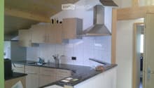 {"type": "Kitchen", "objects": ["sink", "faucet", "cabinets", "countertop", "range hood", "faucet", "bottle", "cup", "faucet", "bottle", "cup", "bottle", "bottle", "bottle", "bottle", "bottle", "bottle", "bottle", "bottle", "bottle", "bottle", "bottle", "