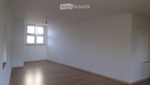 empty room, white walls, wooden floor, window, power outlets