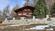 wooden house, stone wall, balcony, snowy ground