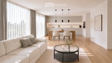 Modern living and dining area with a white sofa, coffee table, dining table with chairs, and a sleek kitchen area in the background.