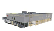 Industrial building, multiple windows, two entrances, yellow accents, grey exterior