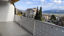 tiled floor, metal railing, balcony, view of the city and mountains