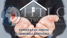 Hands holding house, logo, text 'VENDITA/LOCAZIONE IMMOBILI AZIENDALI'