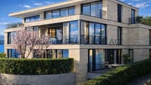 Exklusive Seesicht: Moderne Architektur mit Naturstein und Panoramafenstern im Lakeside Residenz-Ensemble