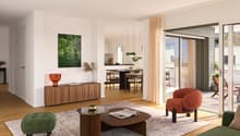 Spacious open-plan living room with large windows, hardwood floors, modern furniture including a wooden sideboard, coffee table, and armchairs in various colors. The room has access to a balcony or terrace through sliding glass doors.