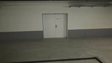 white door, black parking lines
